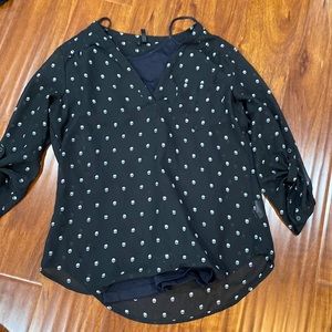 Fun black blouse with little skulls on it